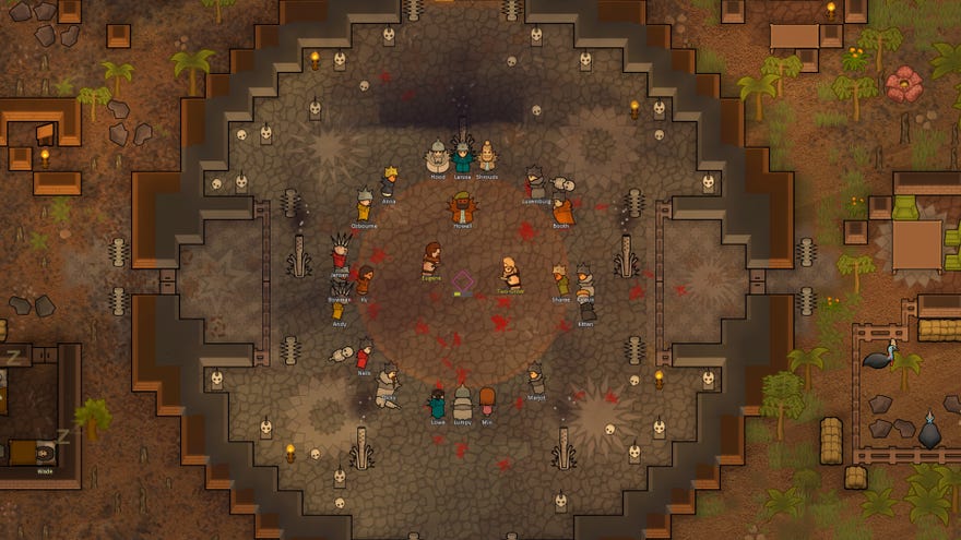 RimWorld - Ideology expansion - A group of colonists stand in a circle surrounded by skulls watching two other colonists fight each other.