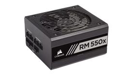 a corsair rm550x power supply, showing its modular design and black/grey colour scheme.