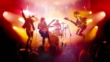 Rock Band 4 artwork featuring a band on stage playing instruments in front of a crowd.