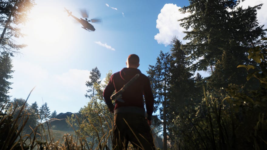A person in a forest with an axe stares up at a helicopter in a Rust screenshot.