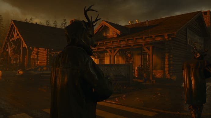 Alan Wake 2 screenshot showing saga approaching a log cabin lit with feint orange glow