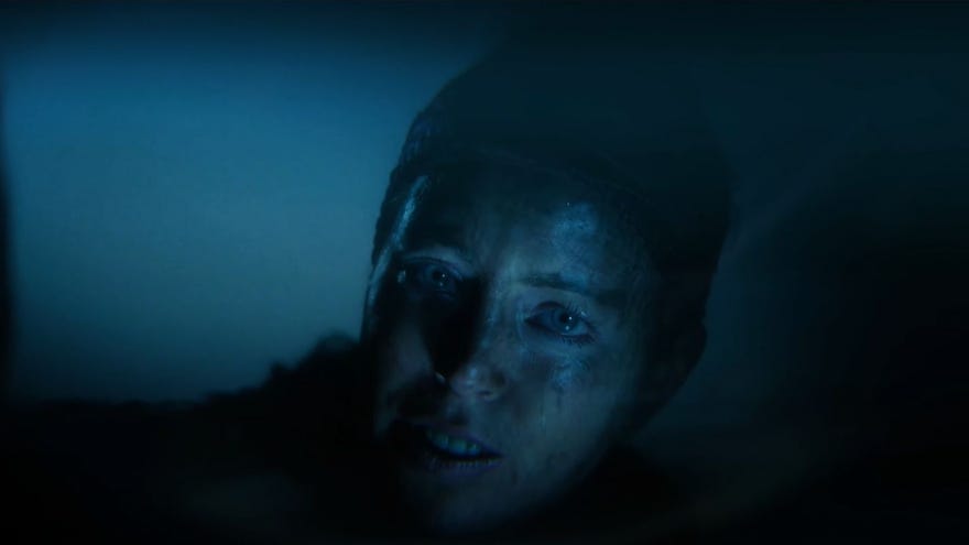 Senua looking at her reflection in a pool in a trailer for Senua's Saga: Hellblade II