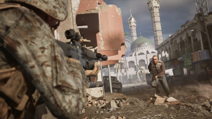 A soldier aims at an armed man in civilian clothing in a Six Days In Fallujah screenshot.