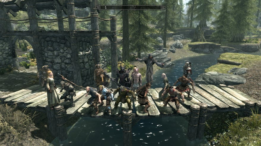 A group of heroes pose by a bridge in the Skyrim Together mod