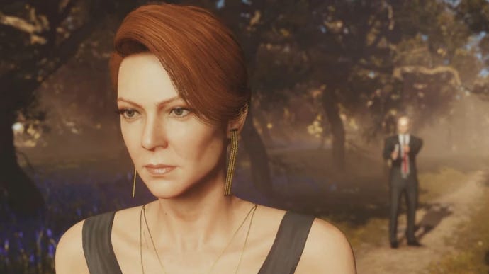Diana Burnwood stares off into the middle distance with Agent 47 standing behind her in Hitman 3