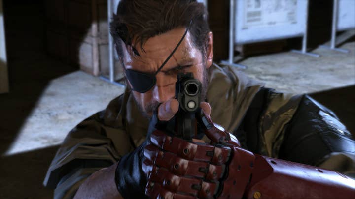 Snake in Metal Gear Solid 5 points his gun at the camera