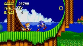 Sonic and Tails prepare to run a loop in a Sonic the Hedgehog 2 screenshot.