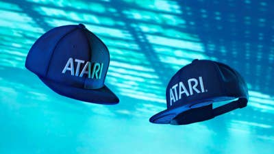 Product shot of two Atari Speakerhats against a blue background