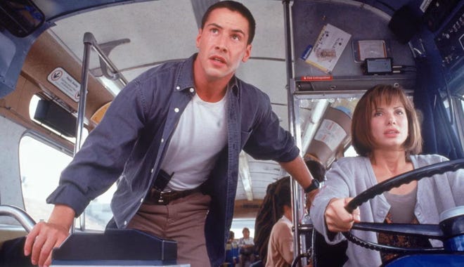 Promotional still of Keanu Reeves and Sandra Bullock in Speed