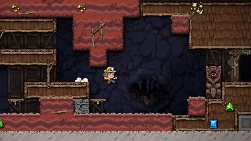 The player jumps unwittingly into an arrow trap in Spelunky 2.
