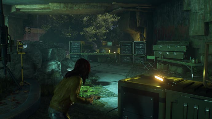 Marvel's Spider Man 2 screenshot showing MJ sneaking through a grey and green hunter hideout holding a stun gun