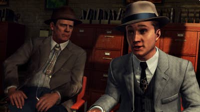 Two men in suits question a person in the Take-Two-published game L.A. Noire