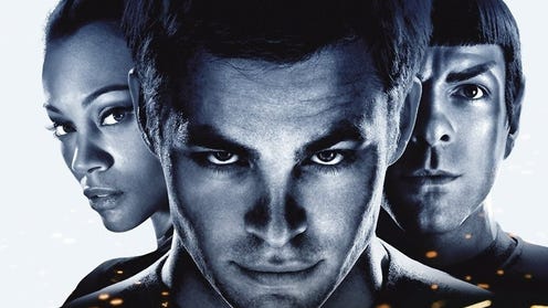 Black and white DVD cover for Star Trek featuring Uhura, Kirk, and Spock