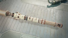 A close-up of a player's custom-made lightsaber in the Workbench of Jedi: Survivor. The lightsaber is made primarily from wood and bone, and sports and orange blade.