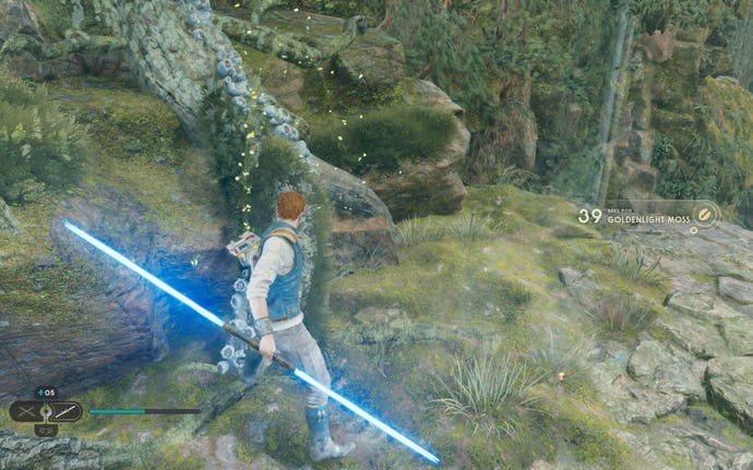 Cal cuts down a plant in a Bilemaw Den on Koboh in Jedi: Survivor.