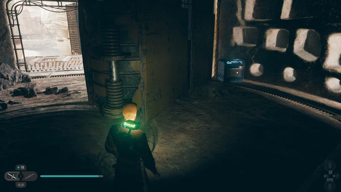 Cal approaches a chest in a darkened room on Koboh in Jedi: Survivor.
