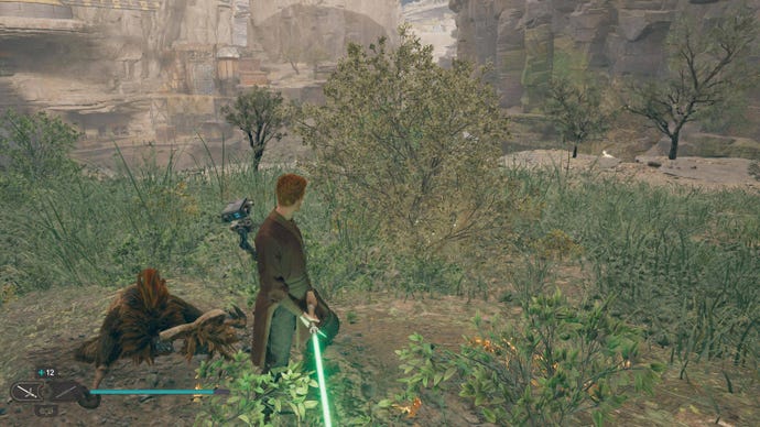 Cal walks towards a glowing plant in Fort Kah'lin in Jedi: Survivor.