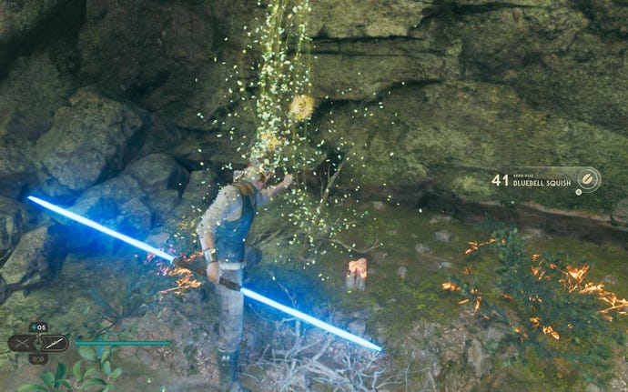 Cal slashes a plant in the Nekko Pools of Koboh in Jedi: Survivor.