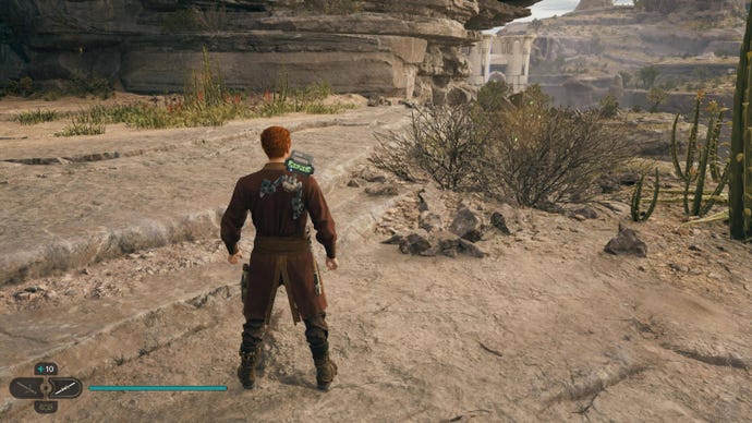 Cal looks at a glowing plant in Rambler's Reach Outpost on Koboh in Jedi: Survivor.