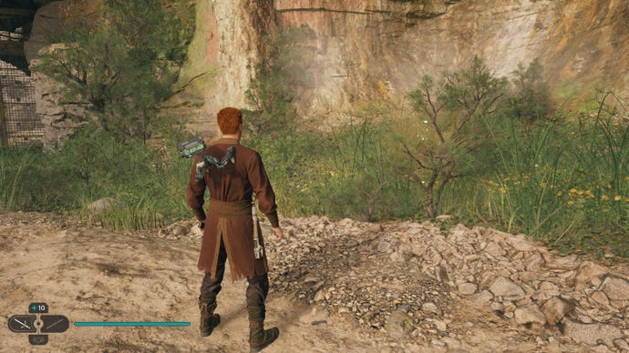 Cal approaches a glowing plant in Swindler's Wash on Koboh in Jedi: Survivor.
