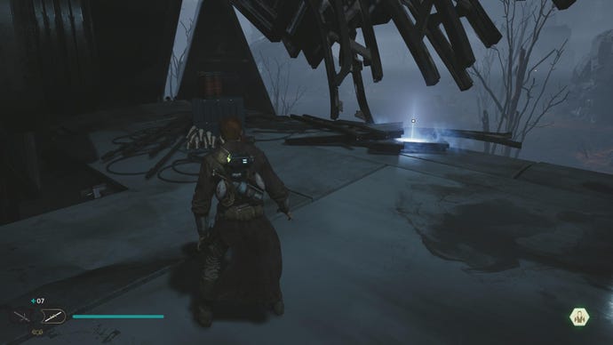 Cal approaches and picks up a collectible on Koboh in Jedi: Survivor.