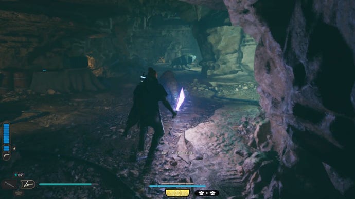 Una caverna, al final de la cual hay una nueva tragamonedas de Star Wars Jedi: Survivor.