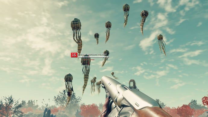Le joueur de Starfield pointe son arme sur un groupe de filtres Flocking Nautiloos flottant dans les airs sur une planète extraterrestre.