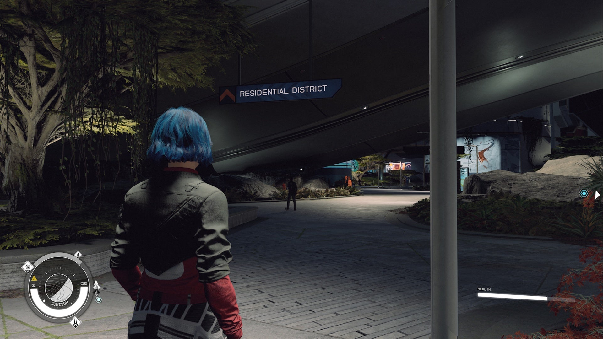 Starfield, el jugador está mirando el nuevo letrero del distrito residencial Atlantis por la noche.