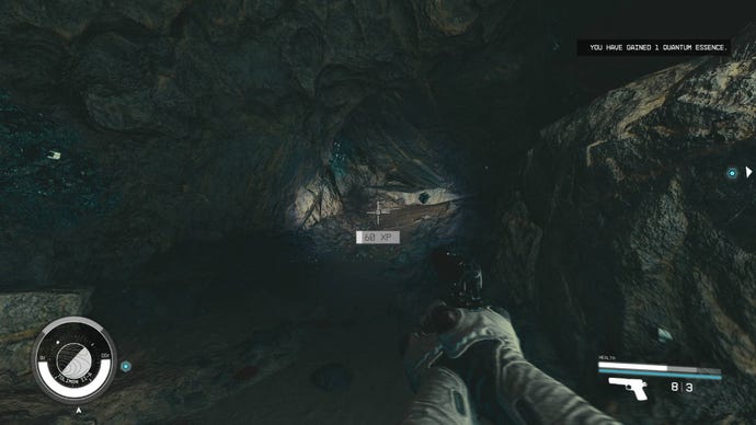 The player in Starfield obtains some Quantum Essence in a cave.