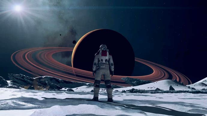 The player character stands in front of a shot of a toroidal gas giant in Bethesda's open-world RPG Starfield.