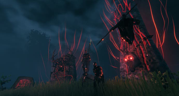 state of the game valheim - players at the summoning cirle, a spooky hilltop structure glowing red