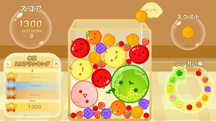 Cute looking cartoon fruits are crammed into a container in the Japanese puzzle game Suika for the Nintendo Switch.