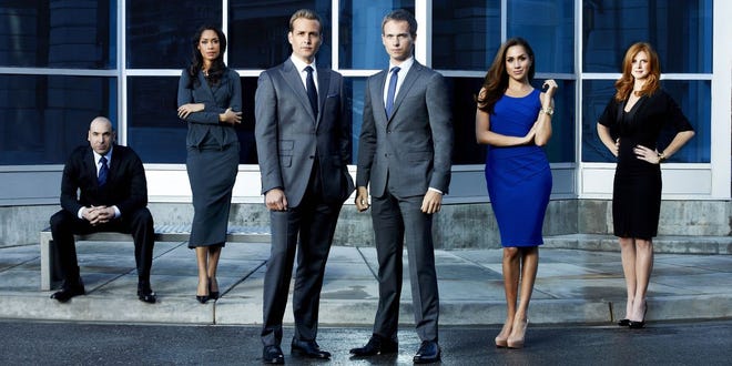 Promotional image for Suits featuring the cast