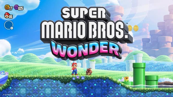 A screenshot of a Mario game with Mario looking up at the large logo for Super Mario Bros. Wonder
