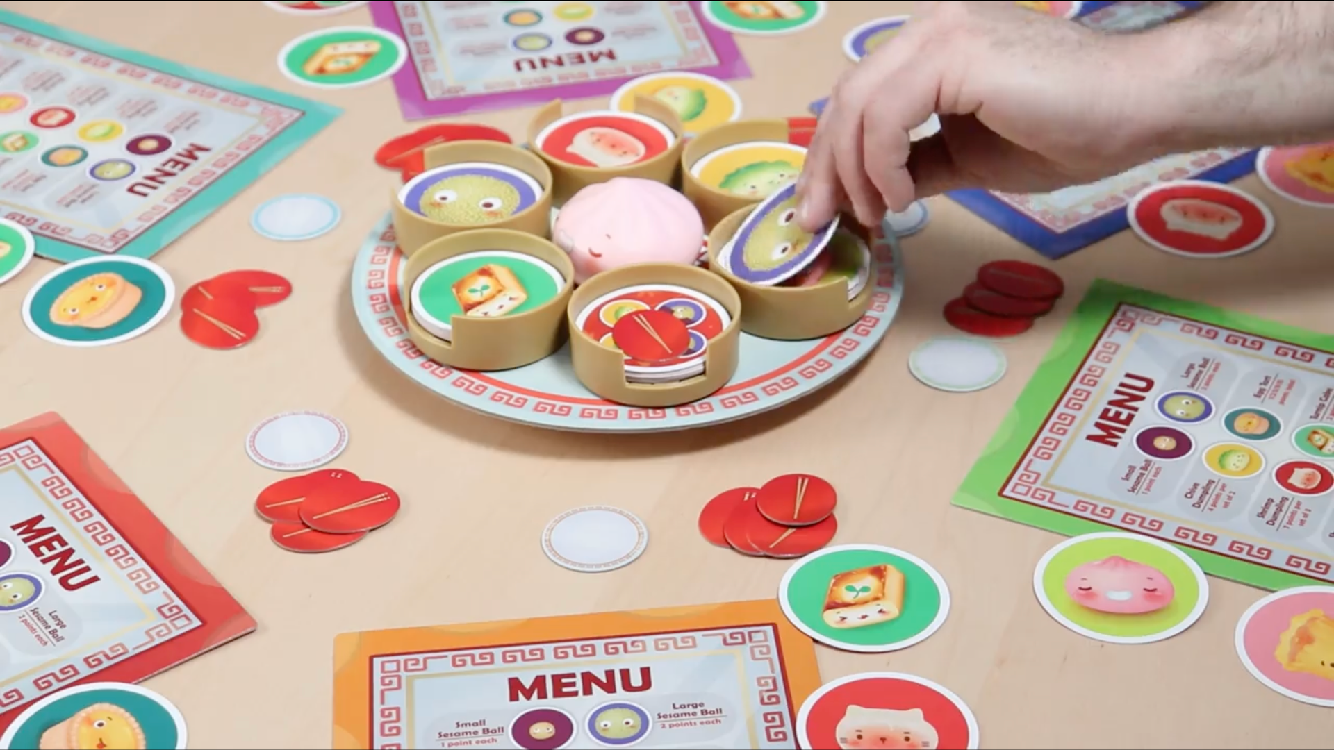 Sushi Go spinoff fills the the table with rotating steamer baskets and ...