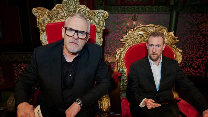 Greg Davies and Alex Horne sitting side-by-side in their thrones in promotional material for the TV series, Taskmaster.
