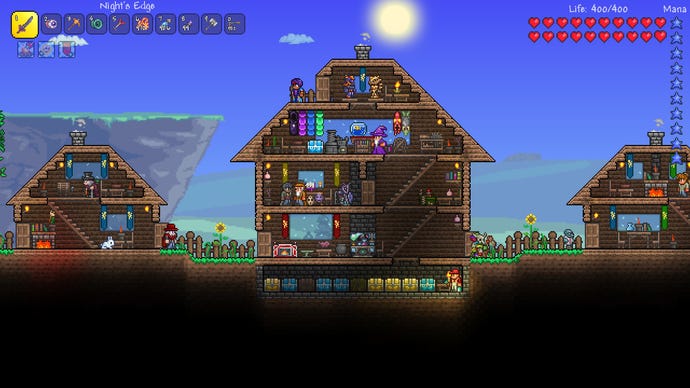 A bustling base in a Terraria screenshot.