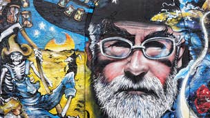 A mural of the late Terry Pratchett and his Discworld characters adorning a wall near Brick Lane in London