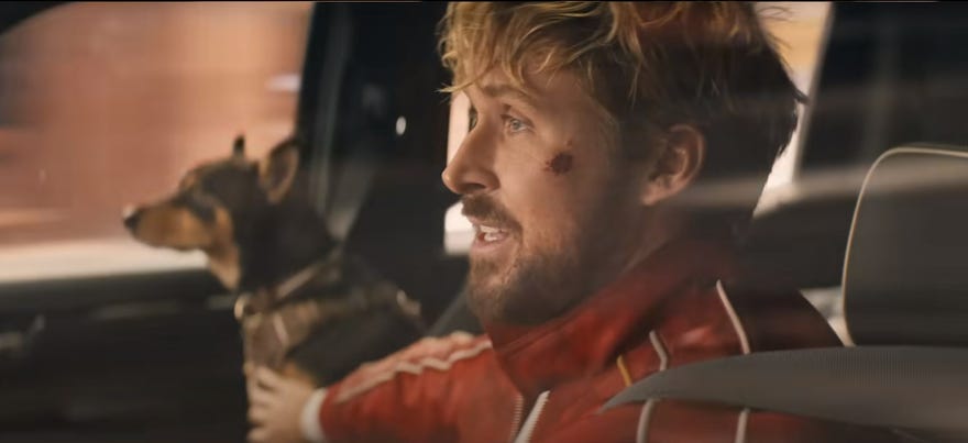 Ryan Gosling and dog in trailer still from The Fall Guy
