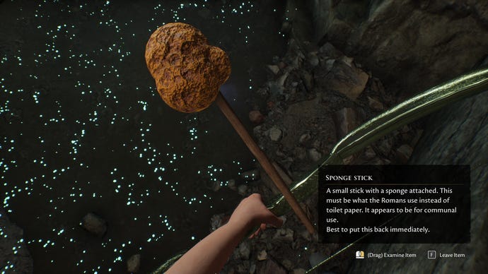Examining a sponge stick in a The Forgotten City screenshot.