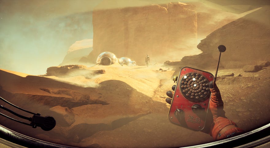 The Invincible - On a desert planet a player in first person holds a red handheld radar while following behind another character approaching a set of chrome structures along the ground.