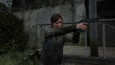 Ellie aiming a pistol in The Last of Us Part 2 Remastered on PS5