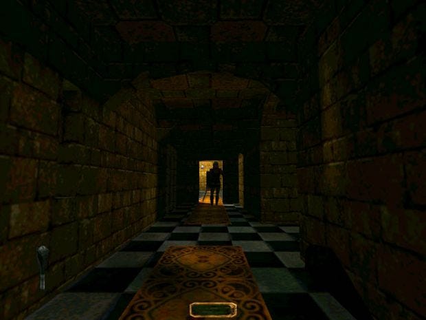 A figure stands at the end of a dark corridor in Thief: The Dark Project