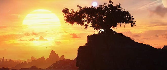 Still from 'Thor: Love and Thunder' A tree silhouette on top of a hill with someone sat under it as the sun rises or sets