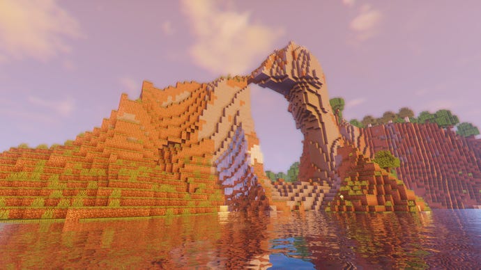 An archway through a cliff in the middle of a lake in Minecraft.