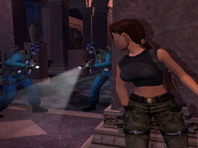 Lara Croft peeks around a corner in Tomb Raider Angel of Darkness, observing two hired goons that are searching for her.