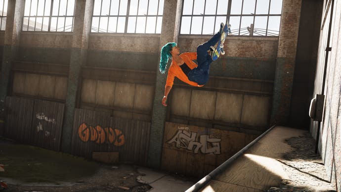 A skater performs a revert in mid-air in an abandoned factory in this screen from Tony Hawk's Pro-Skater 1+2