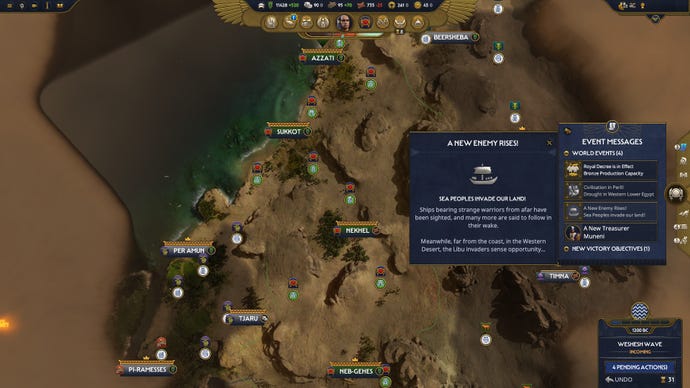 The overworld map, with an alert showing sea people invading the player's territory in Total War: Pharaoh.