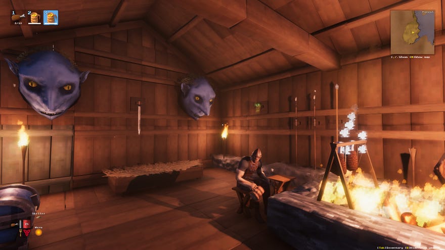 En Valheim -skärmdump av en inre hus, med vapen och troféer på väggen och en spelare i förgrunden som sitter på en pall