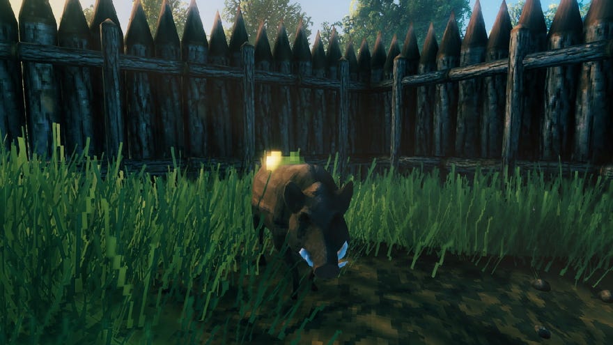 A screenshot from Valheim, which shows a happy boar in its enclosure.